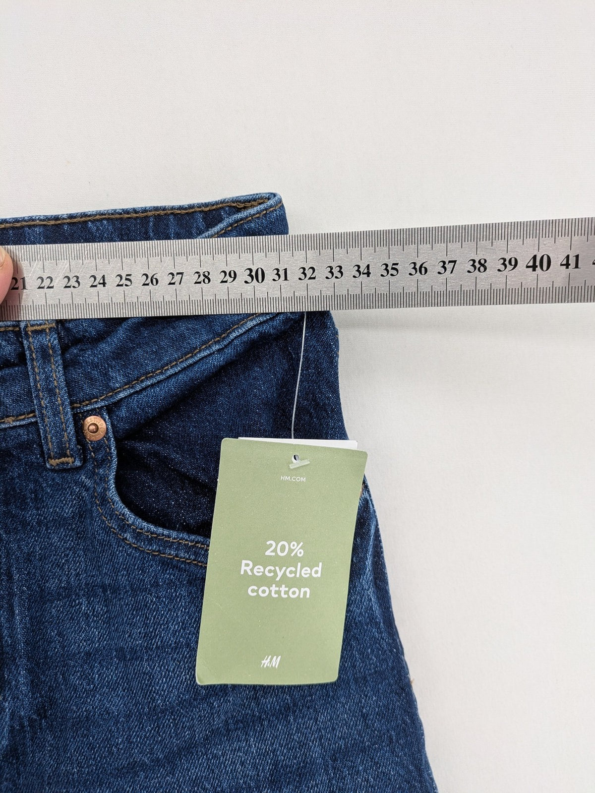 H&M blue wide leg high waist jeans with classic 5-pocket design and stretch denim.