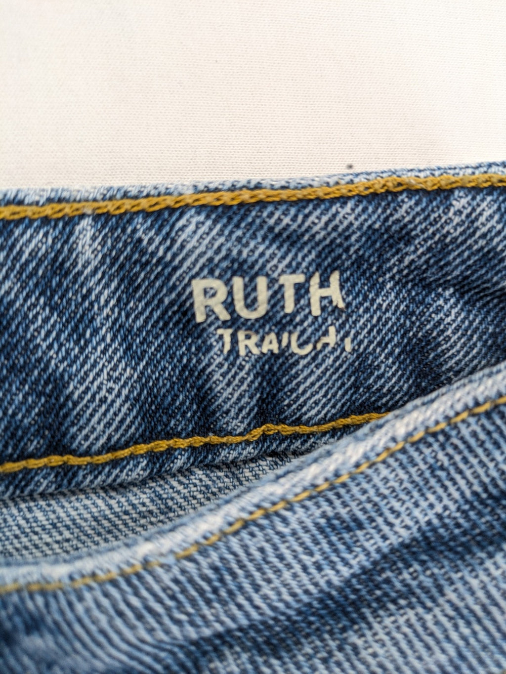 Castro Jeans blue straight leg jeans high waist with white paint splatter details.