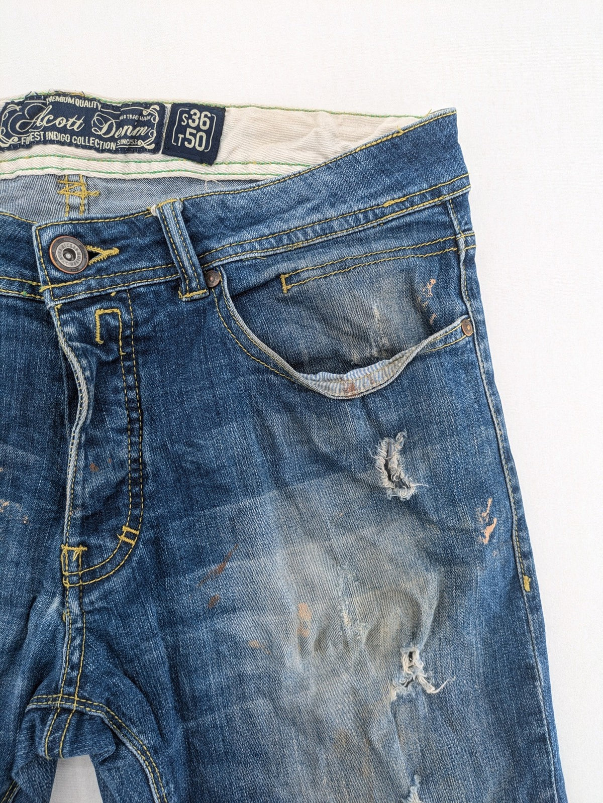 alcott skinny fit jeans blue distressed with button fly and strong wash details