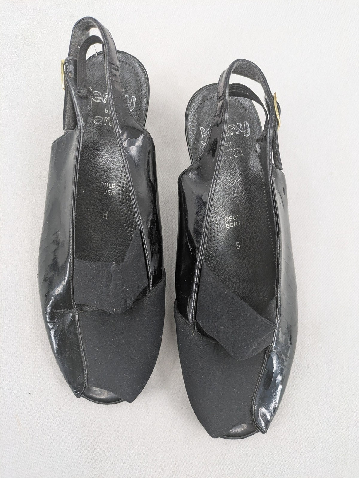 Jenny by Ara black slingback pumps with peep-toe front and glossy finish.