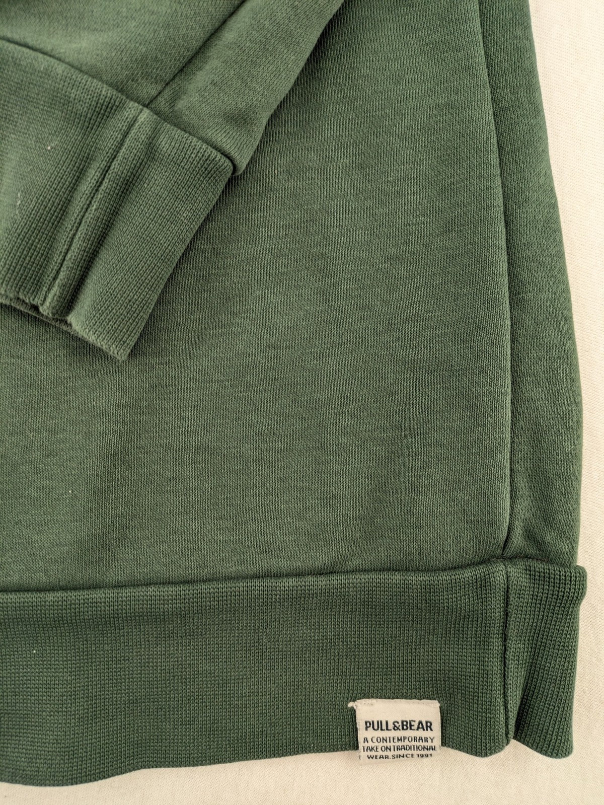 Pull & Bear green sweatshirt with embroidered Germany eagle patch and mock neck.