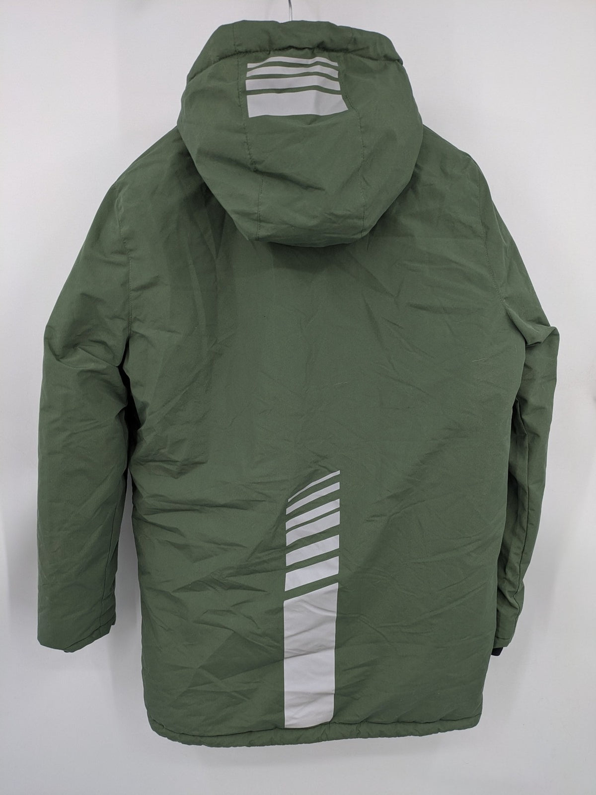 Bad Choices green parka coat with reflective details and logo patch on sleeve.