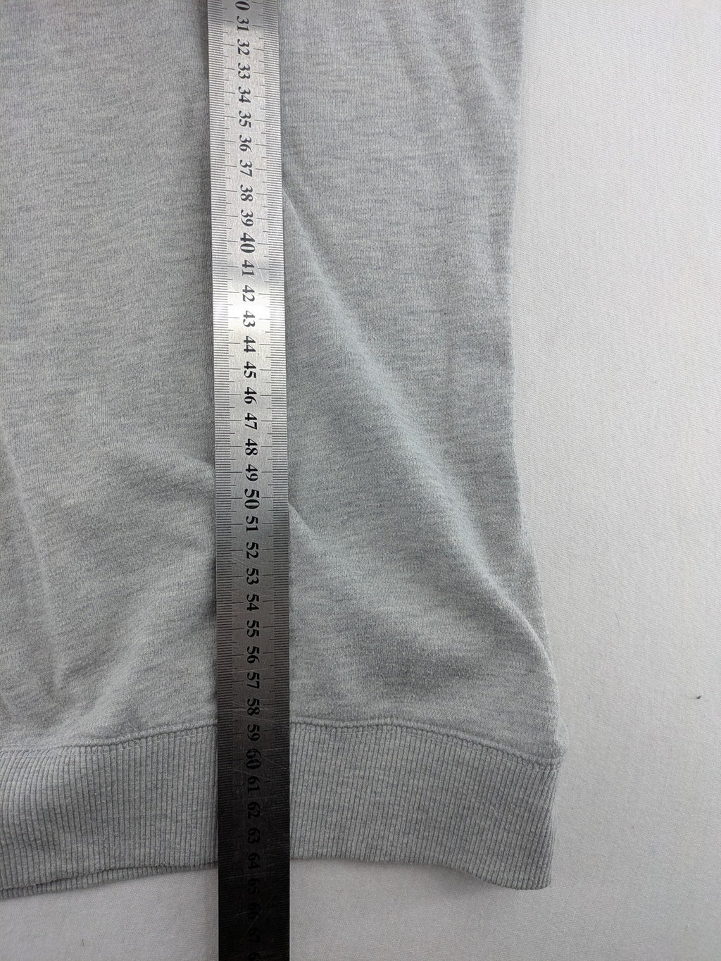 Colours Of The World grey knit jumper with pink drawstring, inspirational graphic print, soft material.