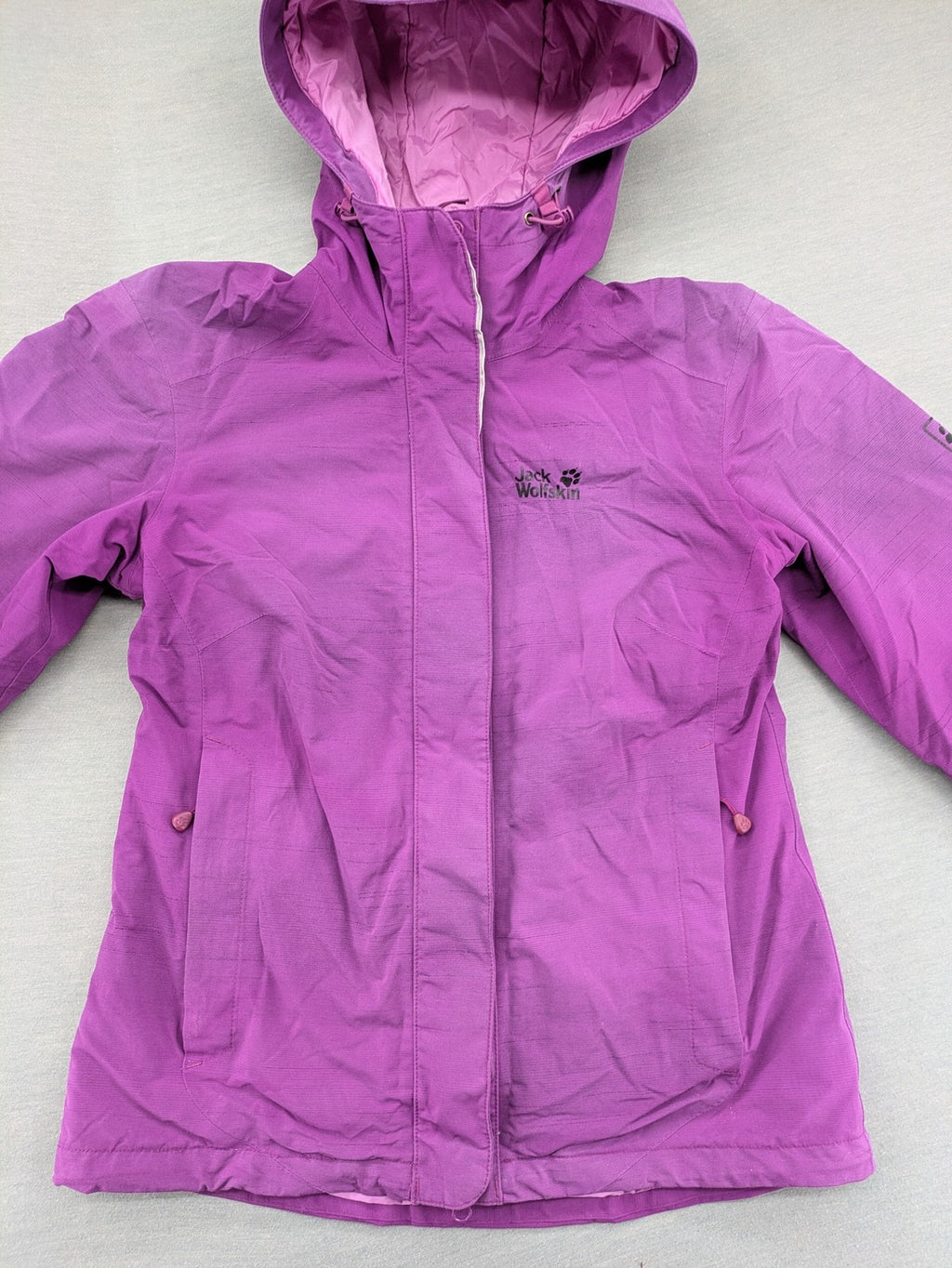 Jack Wolfskin pink purple outdoor jacket with hood, Texapore technology, Microguard insulation.