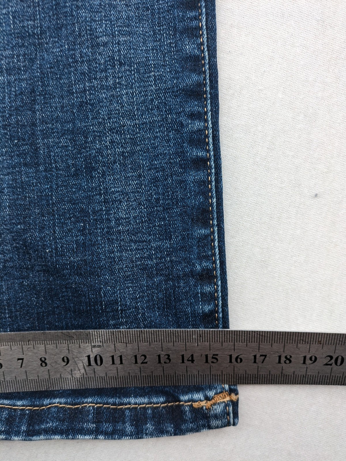 Jack & Jones blue slim fit jeans with faded wash and classic button fly.