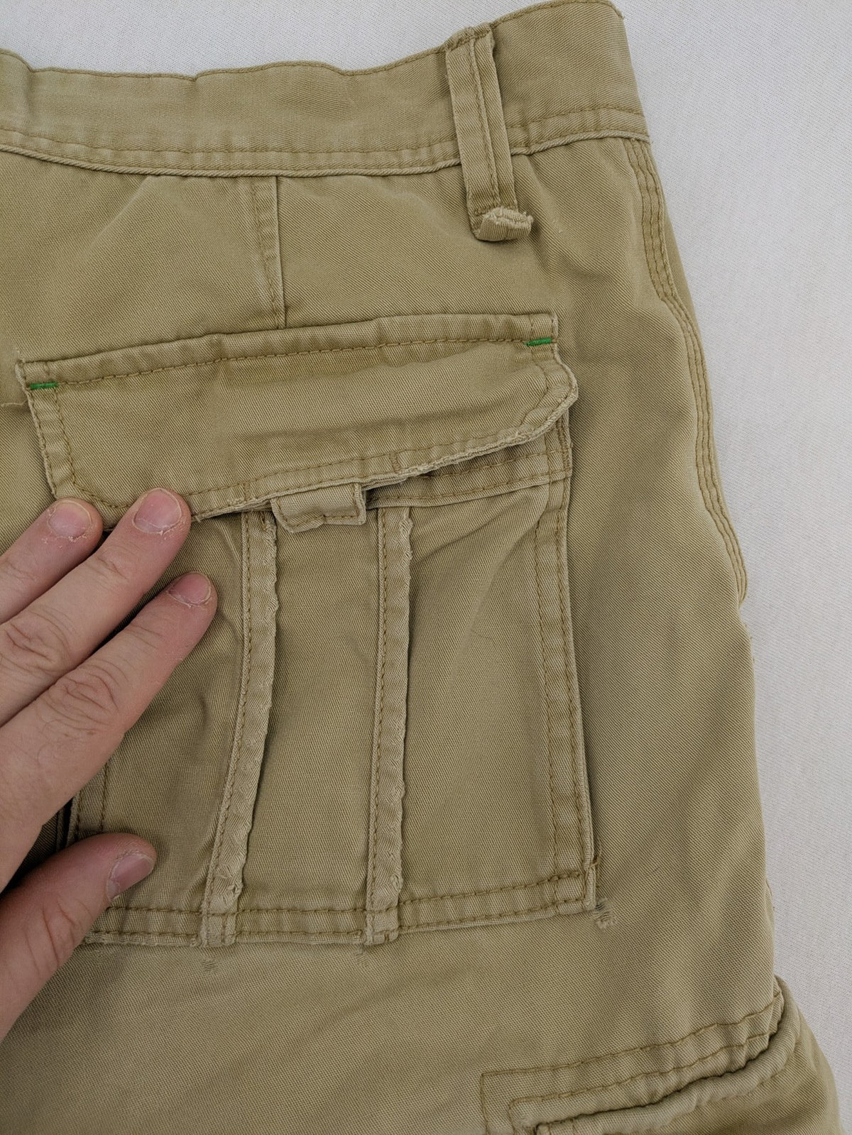Angelo Litrico beige cargo shorts with multiple pockets and durable cotton material.