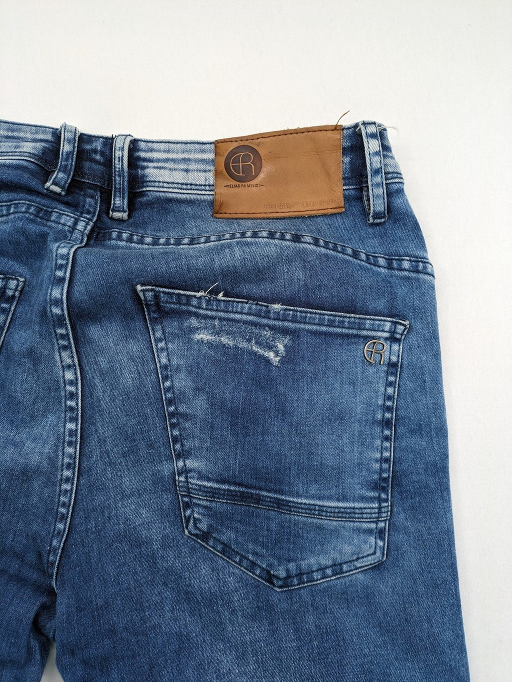 W32 blue straight jeans distressed details tapered fit button fly design