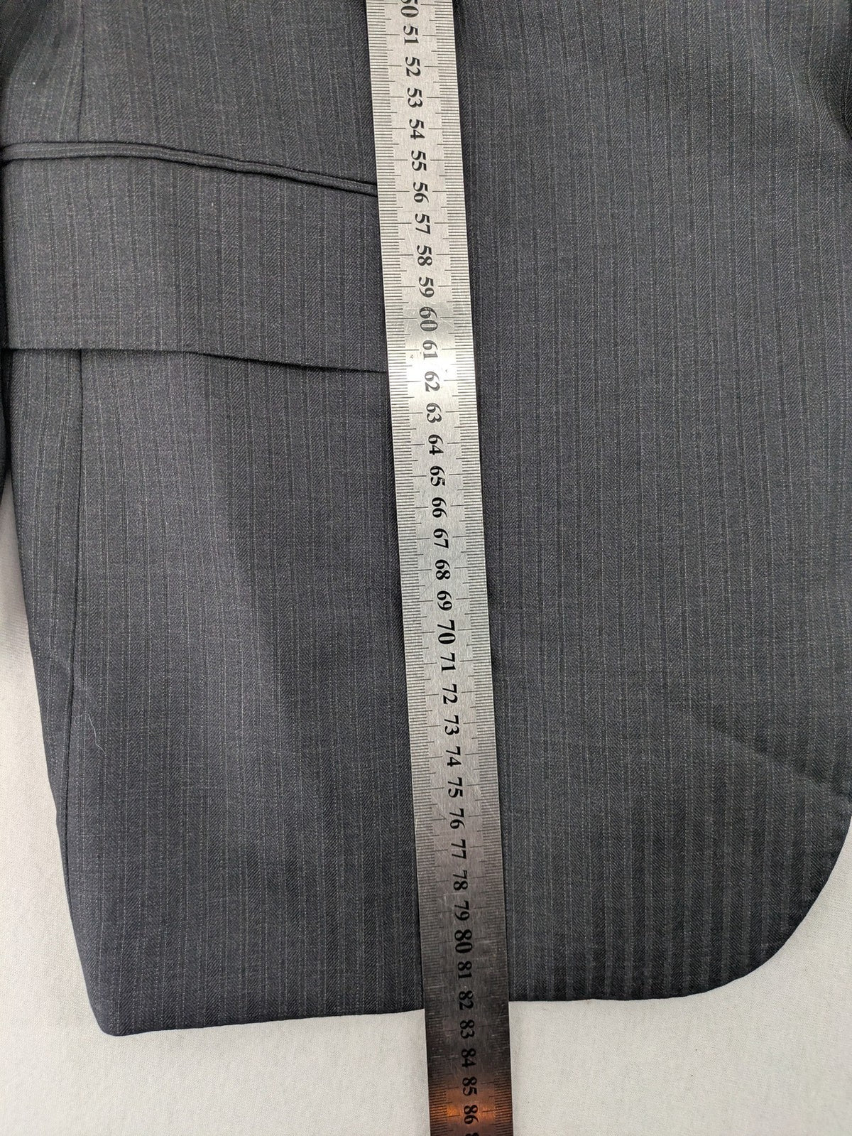 Desch grey blazer with dark grey pinstripe pattern, satin lining, and tailored design.