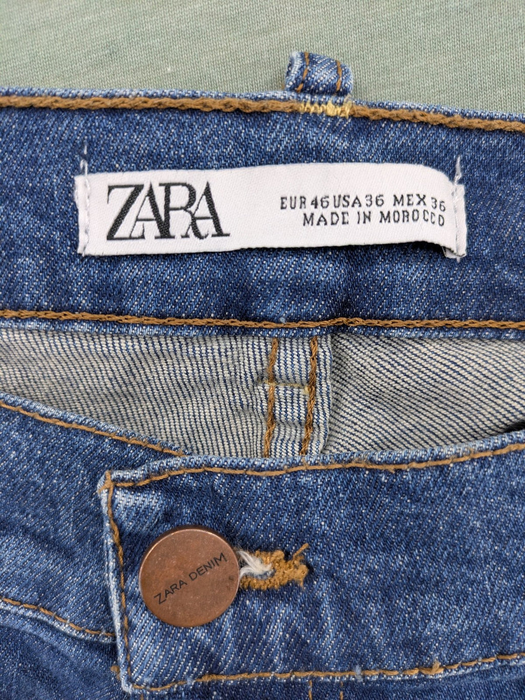 Zara blue straight jeans with medium wash, lightweight denim, and regular fit.