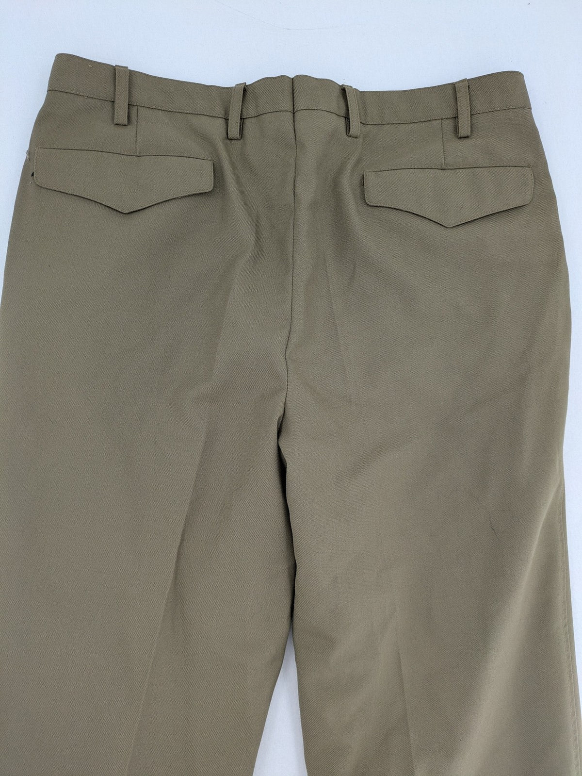 Bundeswehr khaki military uniform trousers with front pleats, zipper, and belt loops.
