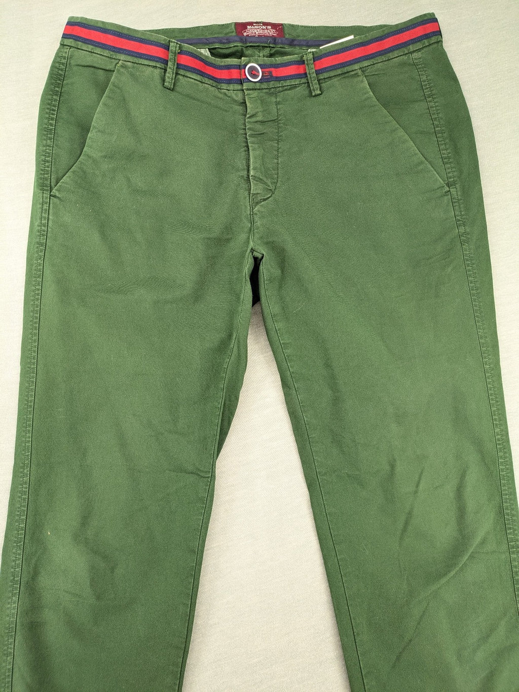 Mason's green chino pants with striped red and blue waistband, cotton stretch material.