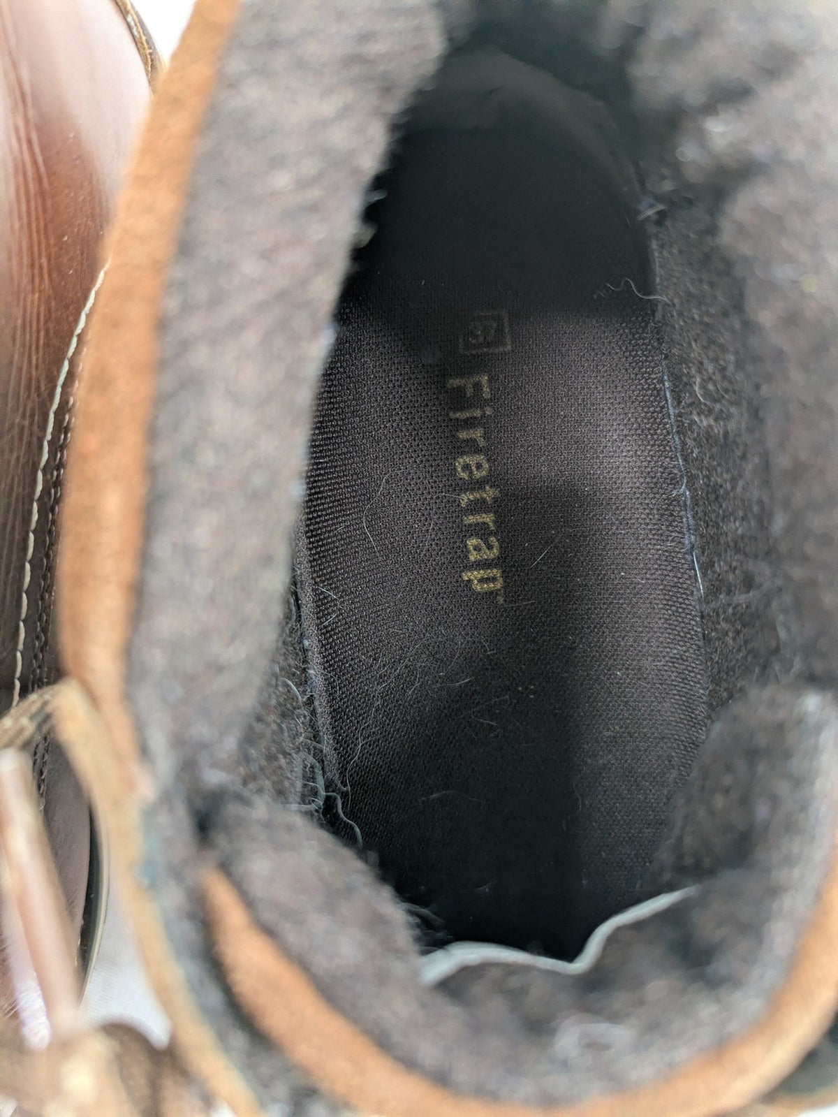 Firetrap brown motorcycle boots with classic lace-up design and padded ankle support.