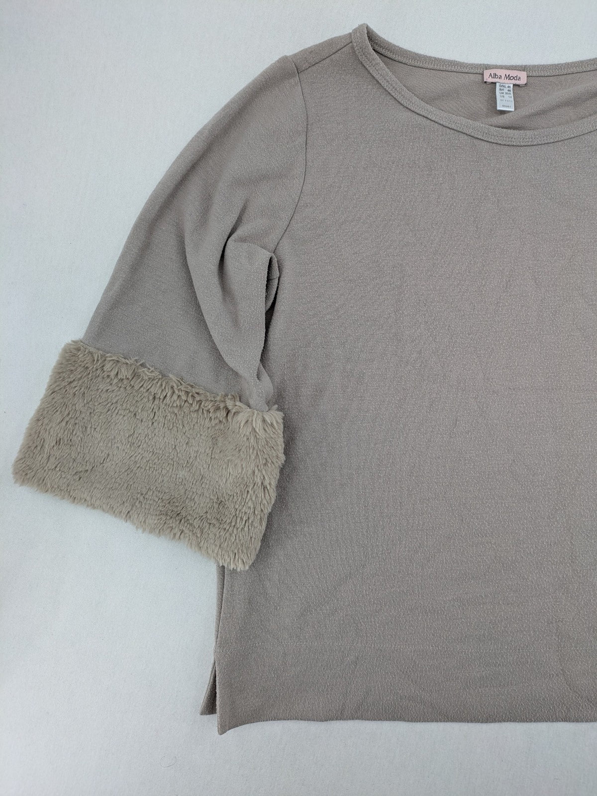 Alba Moda beige turtle neck jumper with plush faux fur cuffs and 3/4 sleeves.