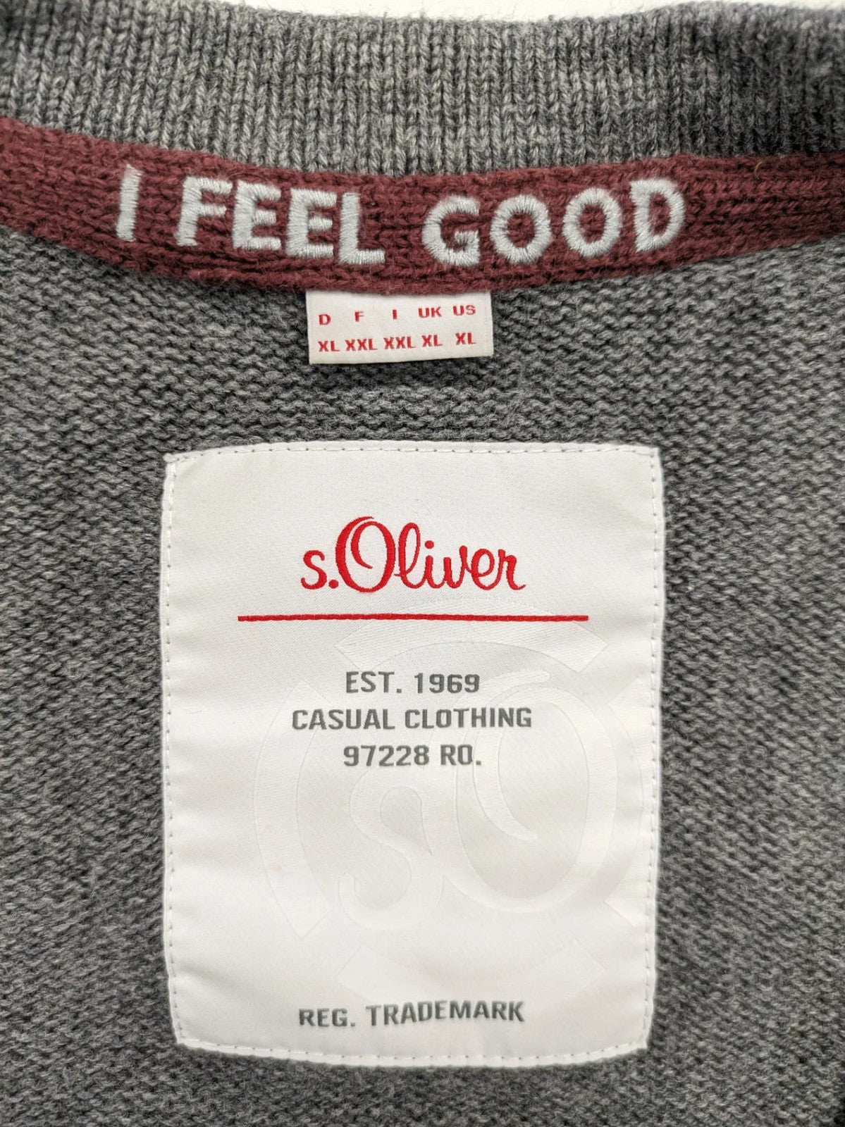 s.Oliver grey turtle neck jumper with varsity college patch and button closure.