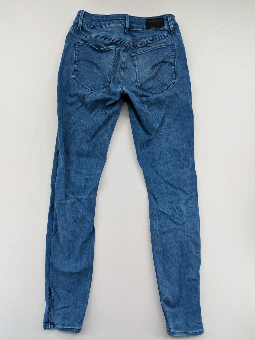 G-Star Raw blue high super skinny jeans with medium wash and logo details.