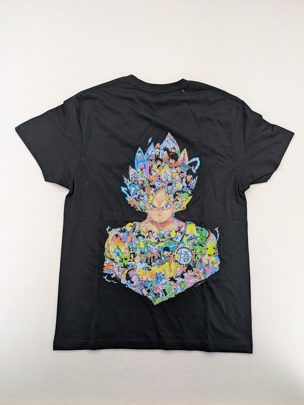 Dragon Ball Z grey t-shirt featuring Super Saiyajin Goku collage graphic design.