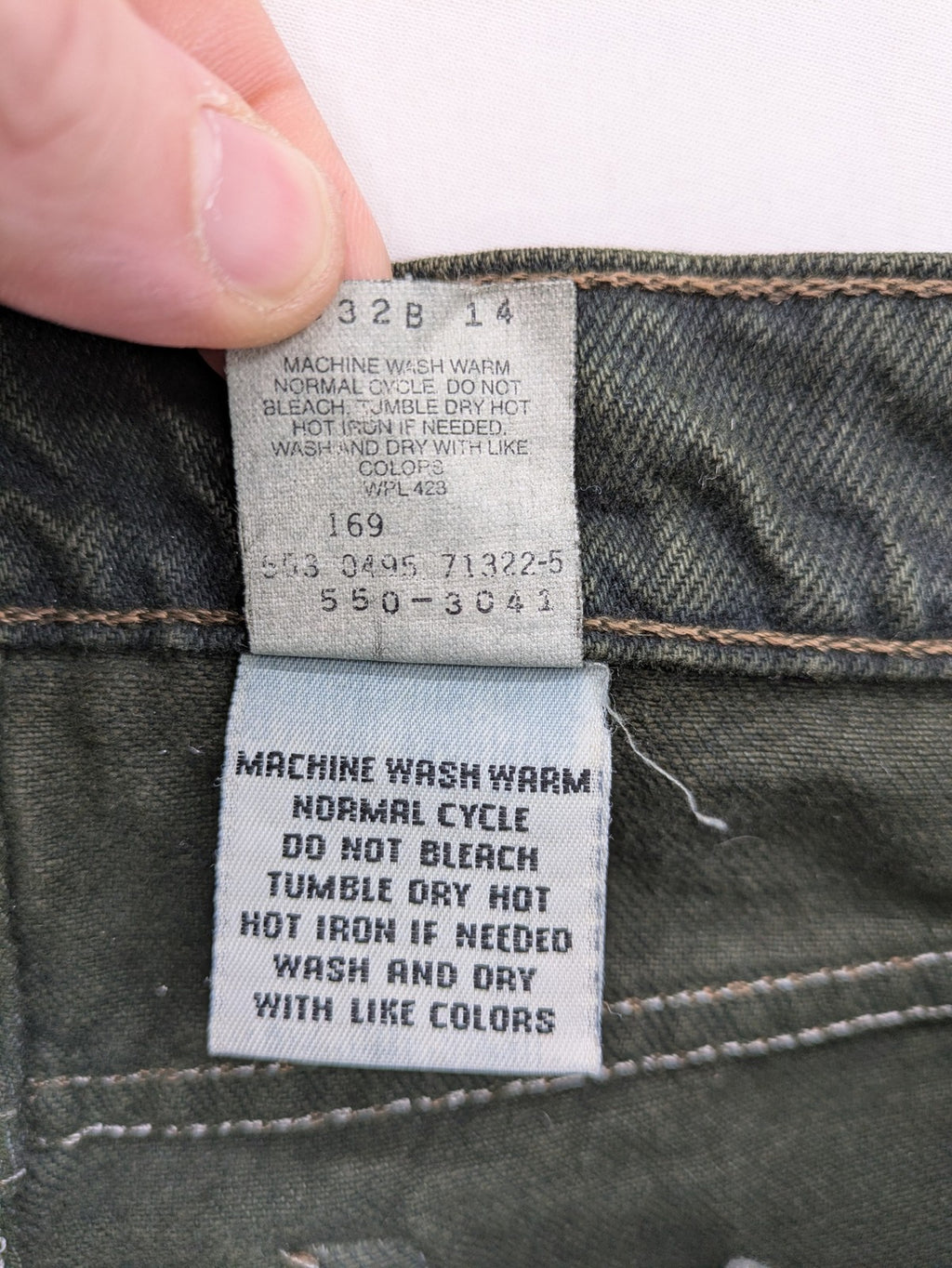 Levi's green 550 relaxed fit tapered jeans, vintage denim, made in USA.