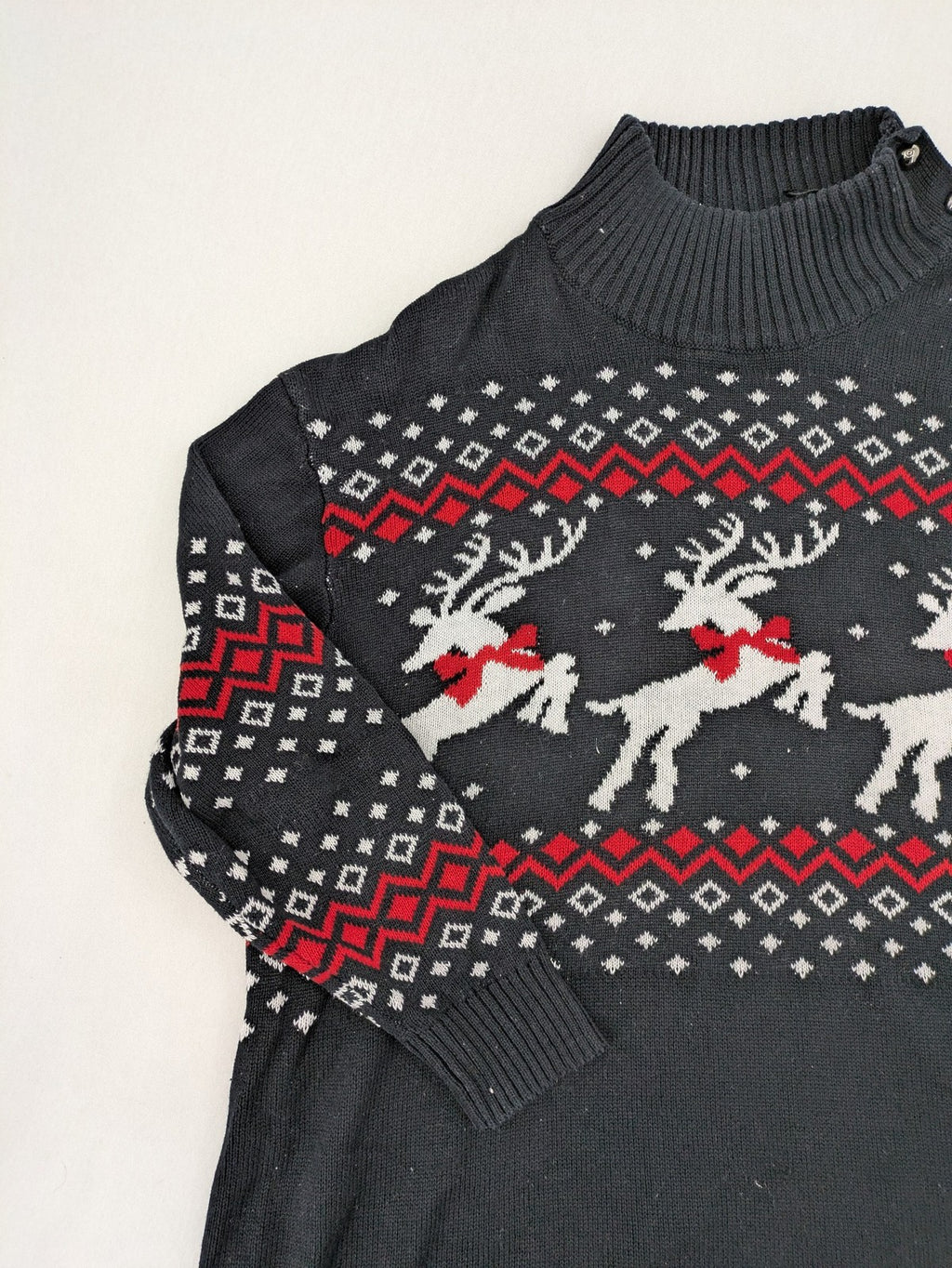 BPC Bonprix grey red white turtle neck jumper with reindeer Fair-Isle pattern and decorative buttons.