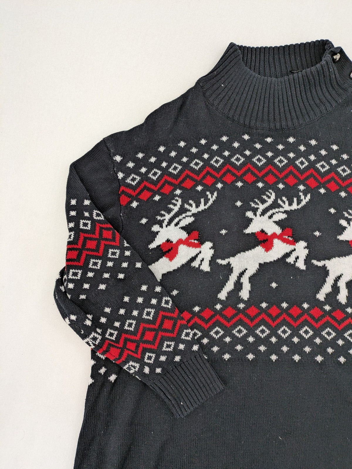 BPC Bonprix grey red white turtle neck jumper with reindeer Fair-Isle pattern and decorative buttons.