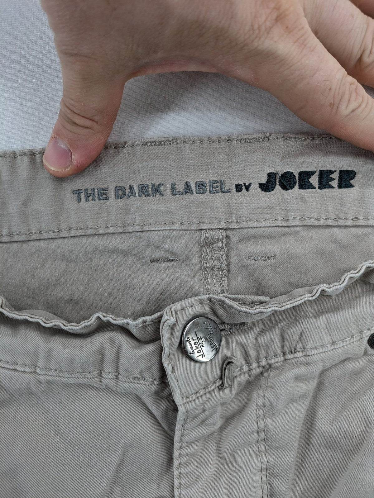 Joker beige chino pants 5-pocket design made from cotton stretch blend.