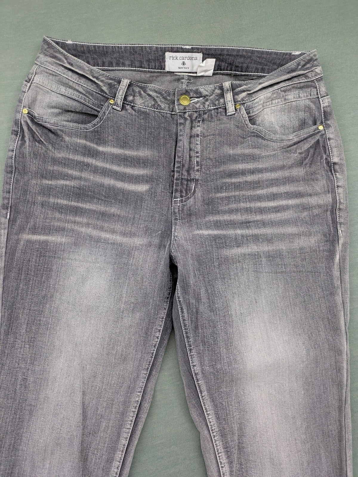 Rick Cardona grey cropped straight jeans with frayed hems and sparkling rhinestone details.