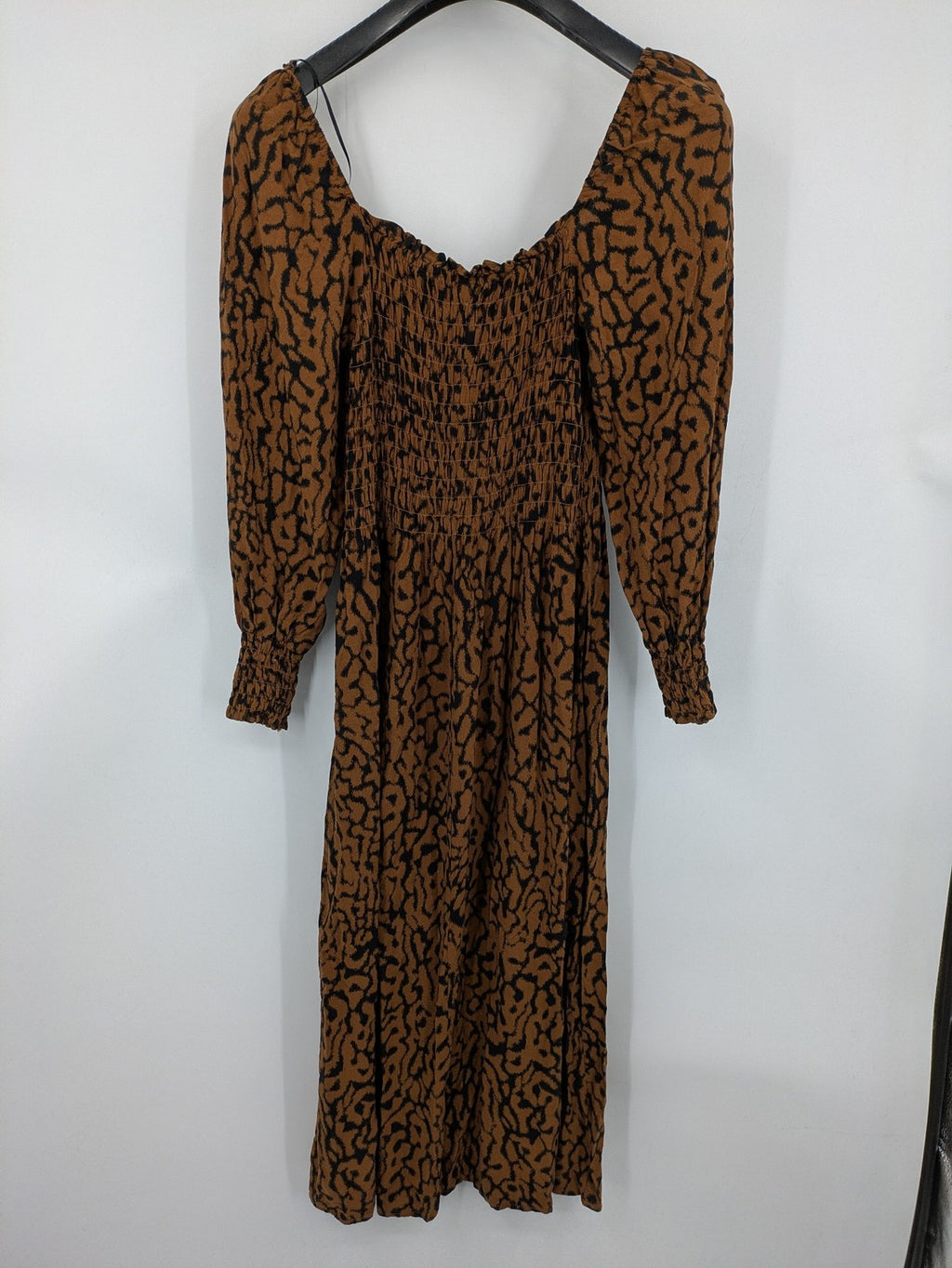 H&M brown and black animal print midi dress with smocked bodice and square neckline.