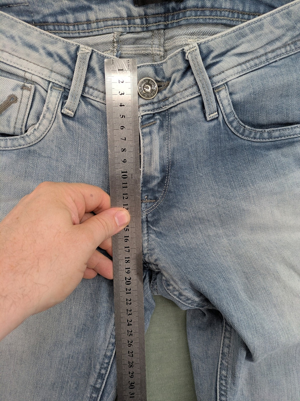 G-Star Raw blue straight leg jeans with classic 5-pocket design and light wash denim.