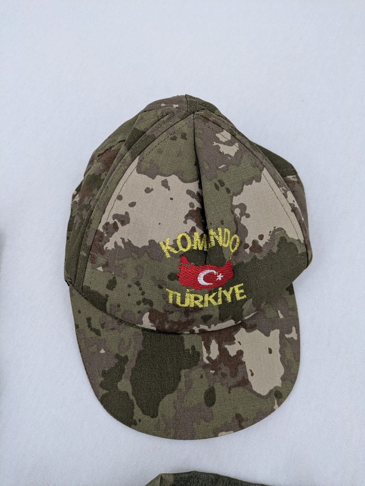 CAMOUFLAGE military uniform multi camouflage pattern with Türkiye patches and Komando embroidery.