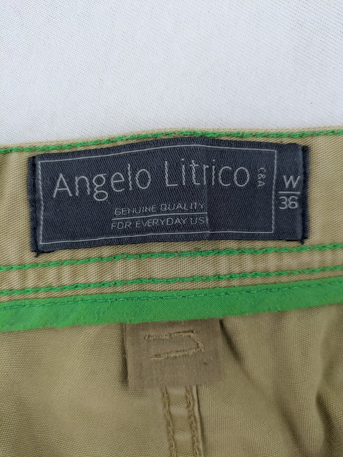 Angelo Litrico beige cargo shorts with multiple pockets and durable cotton material.