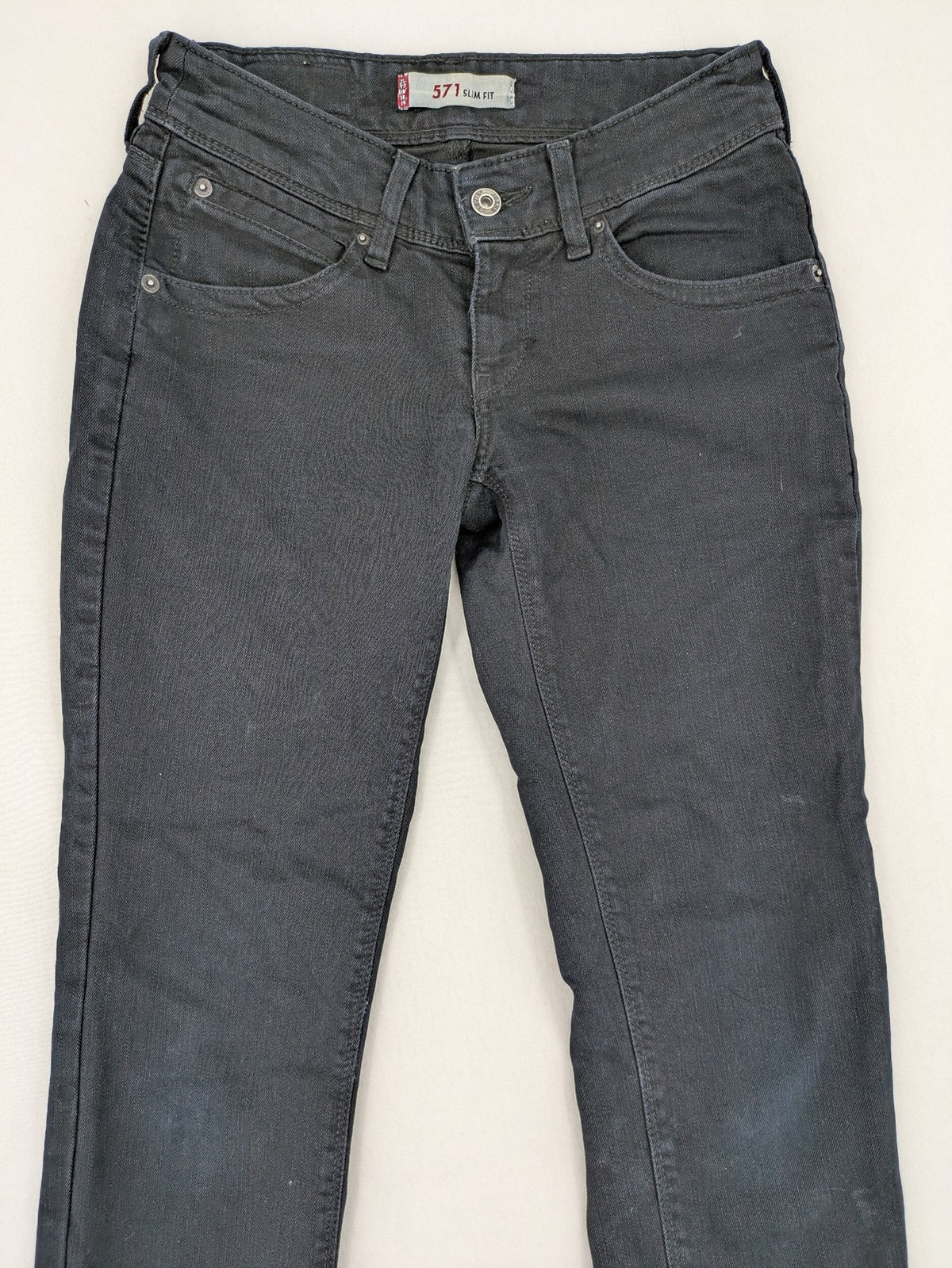 Levi's black slim fit jeans with classic 5-pocket design and zipper fly.