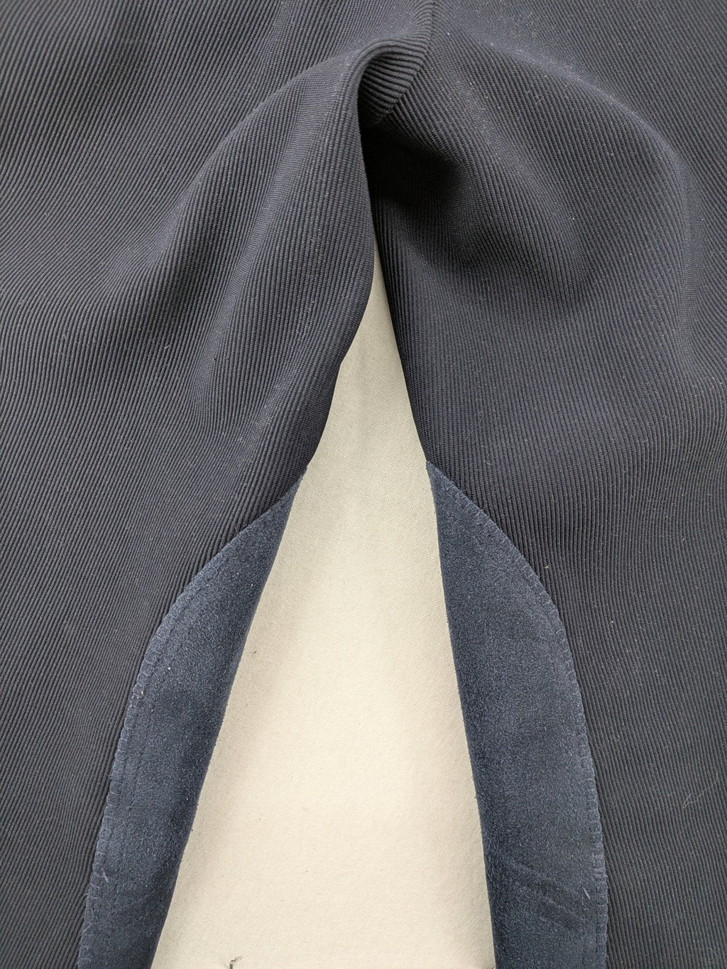 Cavalliero blue youth riding pants with knee patches and ribbed microfiber fabric.