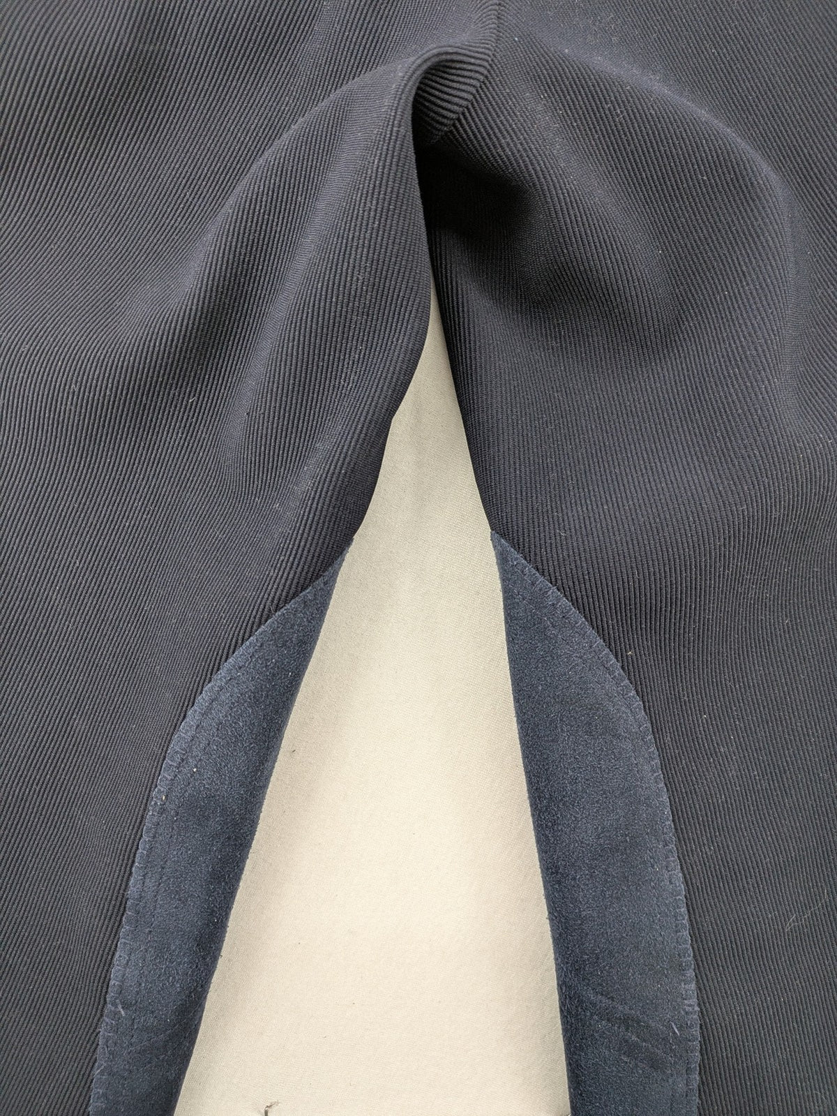 Cavalliero blue youth riding pants with knee patches and ribbed microfiber fabric.