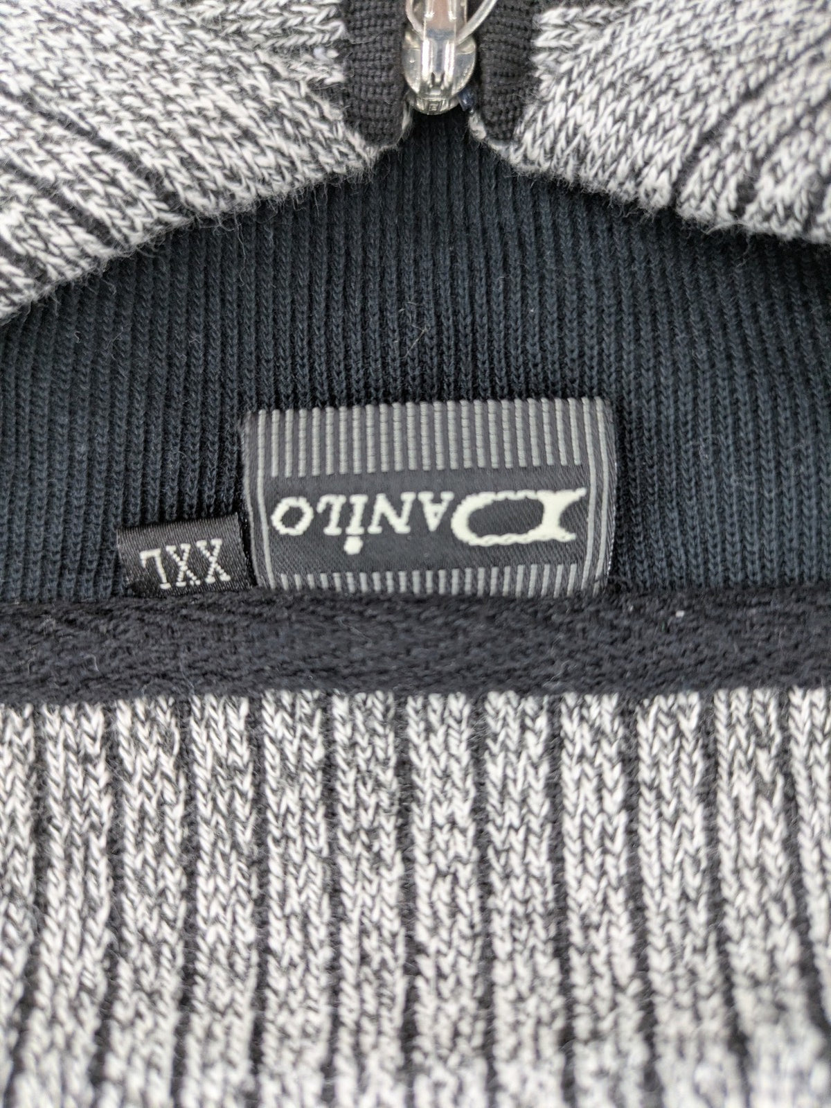 Danilo turtle neck jumper grey melange with black zipper and ribbed cuffs.