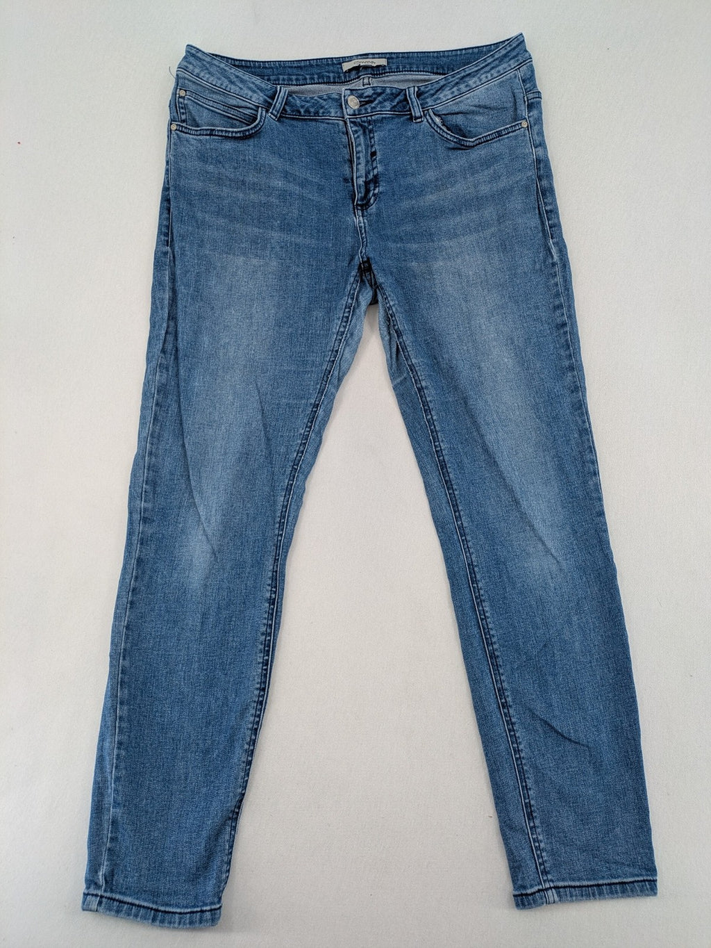 Comma blue skinny fit jeans with classic 5-pocket design and stretch denim material.