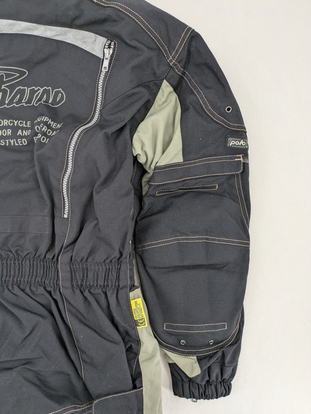 Polo multi biker jacket nylon with adjustable fit and multiple pockets.