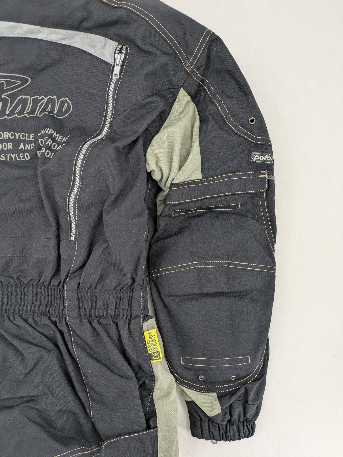 Polo multi biker jacket nylon with adjustable fit and multiple pockets.