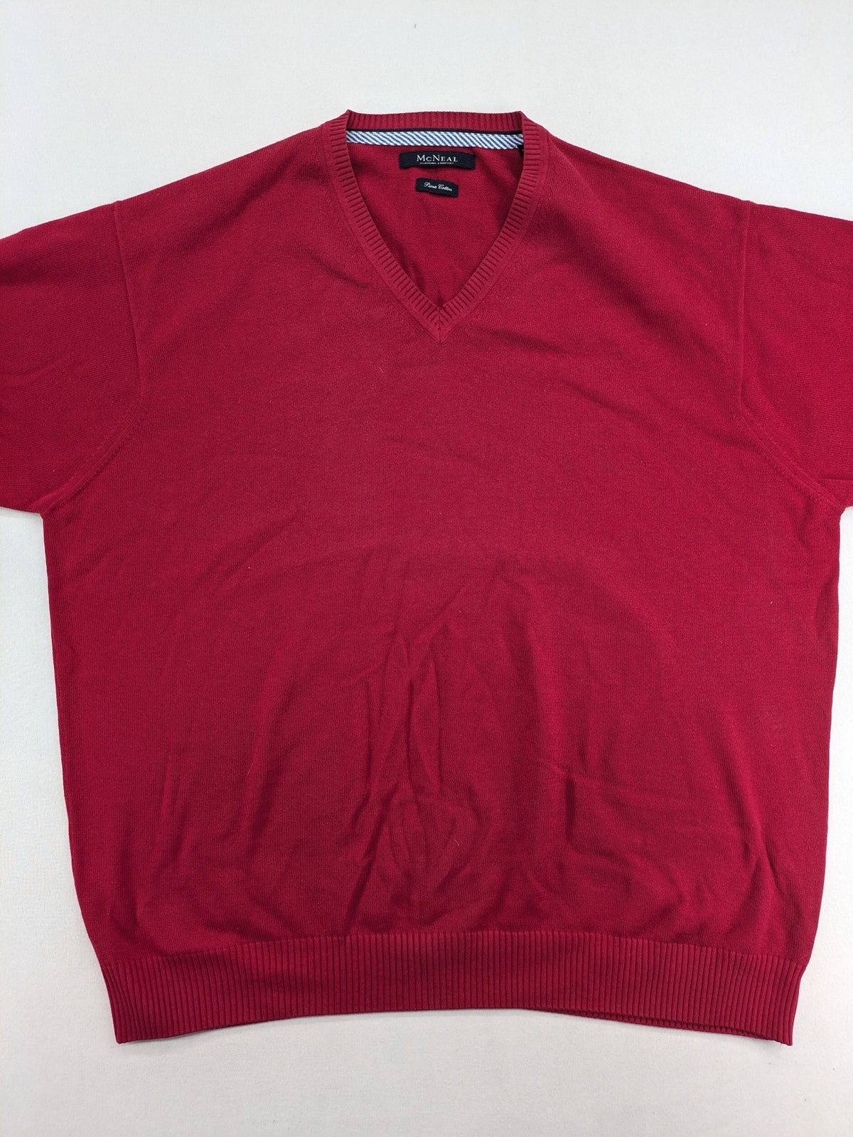McNeal red turtle neck jumper V-neck design with ribbed cuffs and hem.
