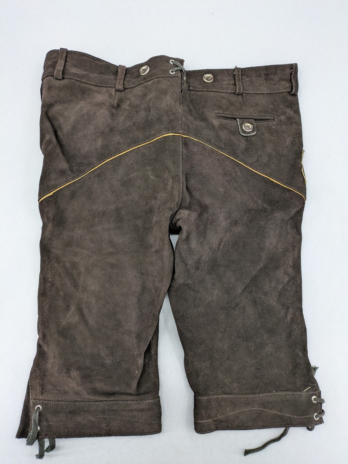 Braun traditional leather pants brown suede with intricate embroidery on bib and legs.