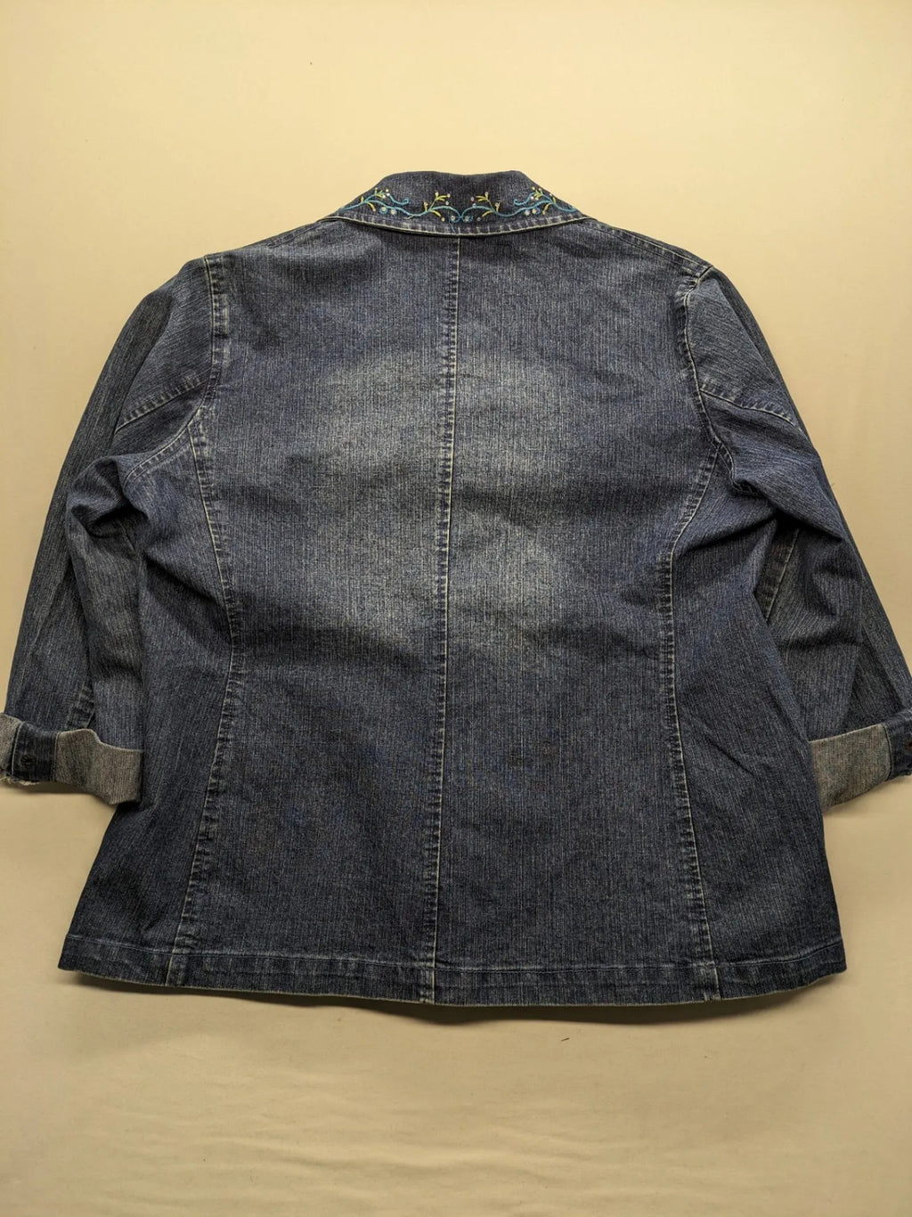 Zala blue denim blazer jacket with embroidered details and classic button closure.
