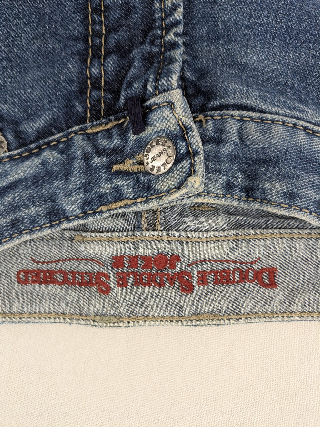 Joker blue straight leg jeans with double saddle stitched detail and classic denim wash.