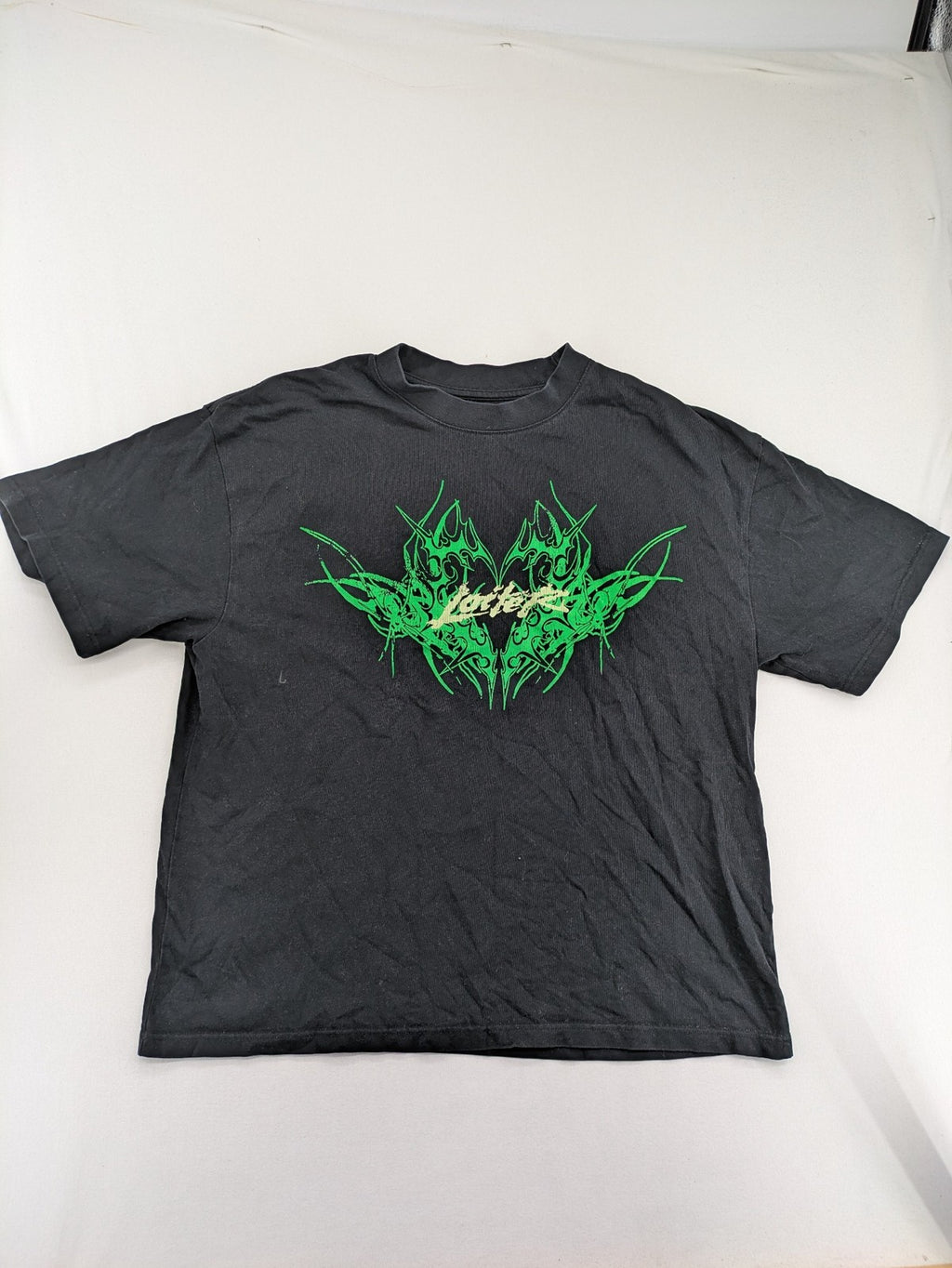 Lotter XL t-shirt black with neon green tribal graphic print on front and back.