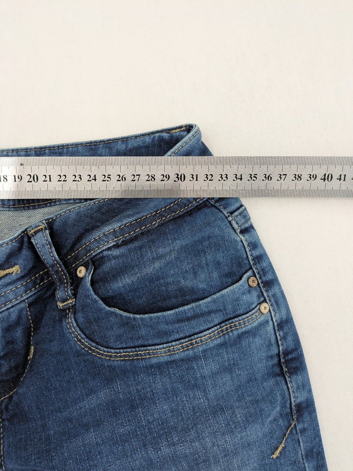 LTB blue bootcut jeans with classic 5-pocket design and low-rise fit.