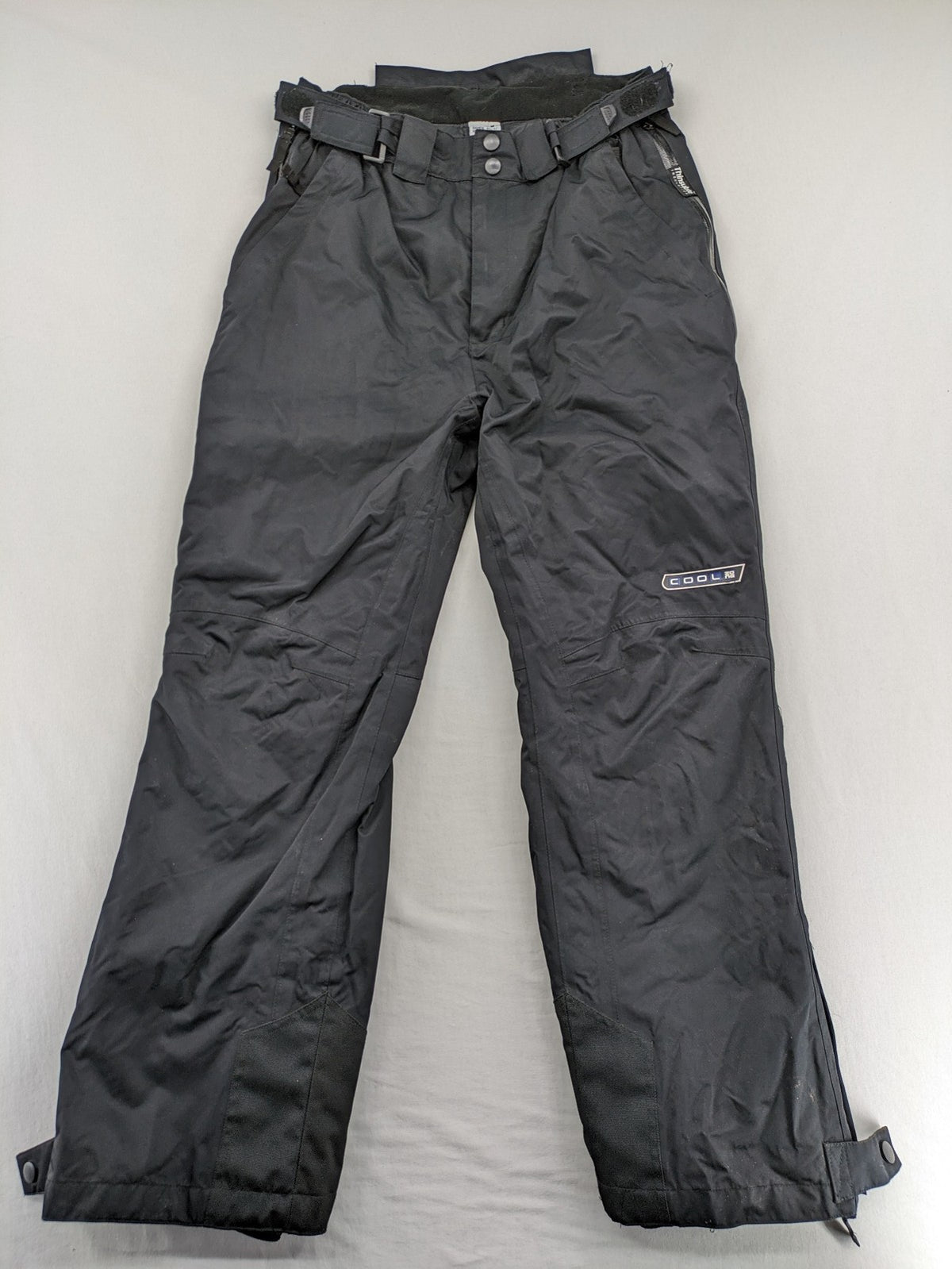 COOLE black ski pants with Thinsulate insulation and versatile unisex design.