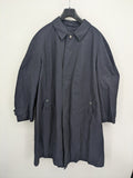 Freic navy trench coat single-breasted design with elegant collar and buttoned flap pockets.