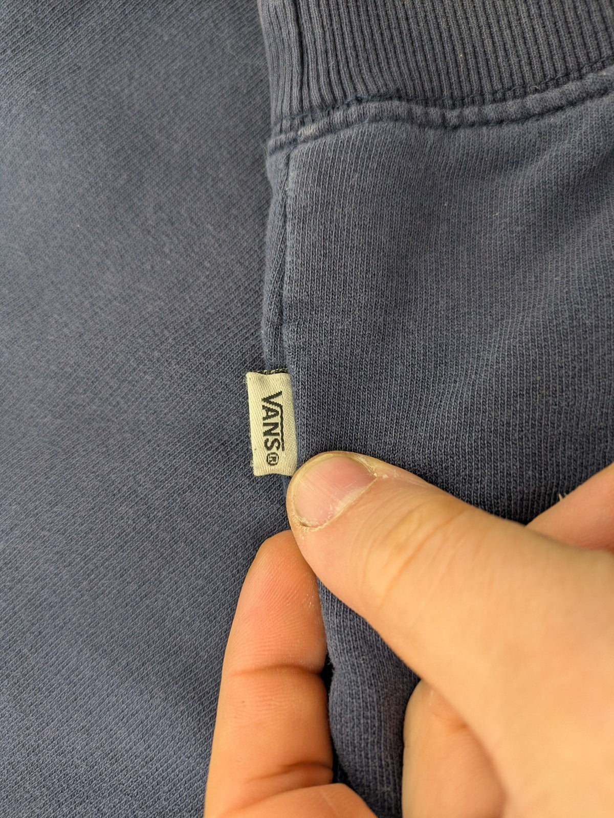 Vans zip-through hoodie navy blue with large yellow logo and kangaroo pocket.