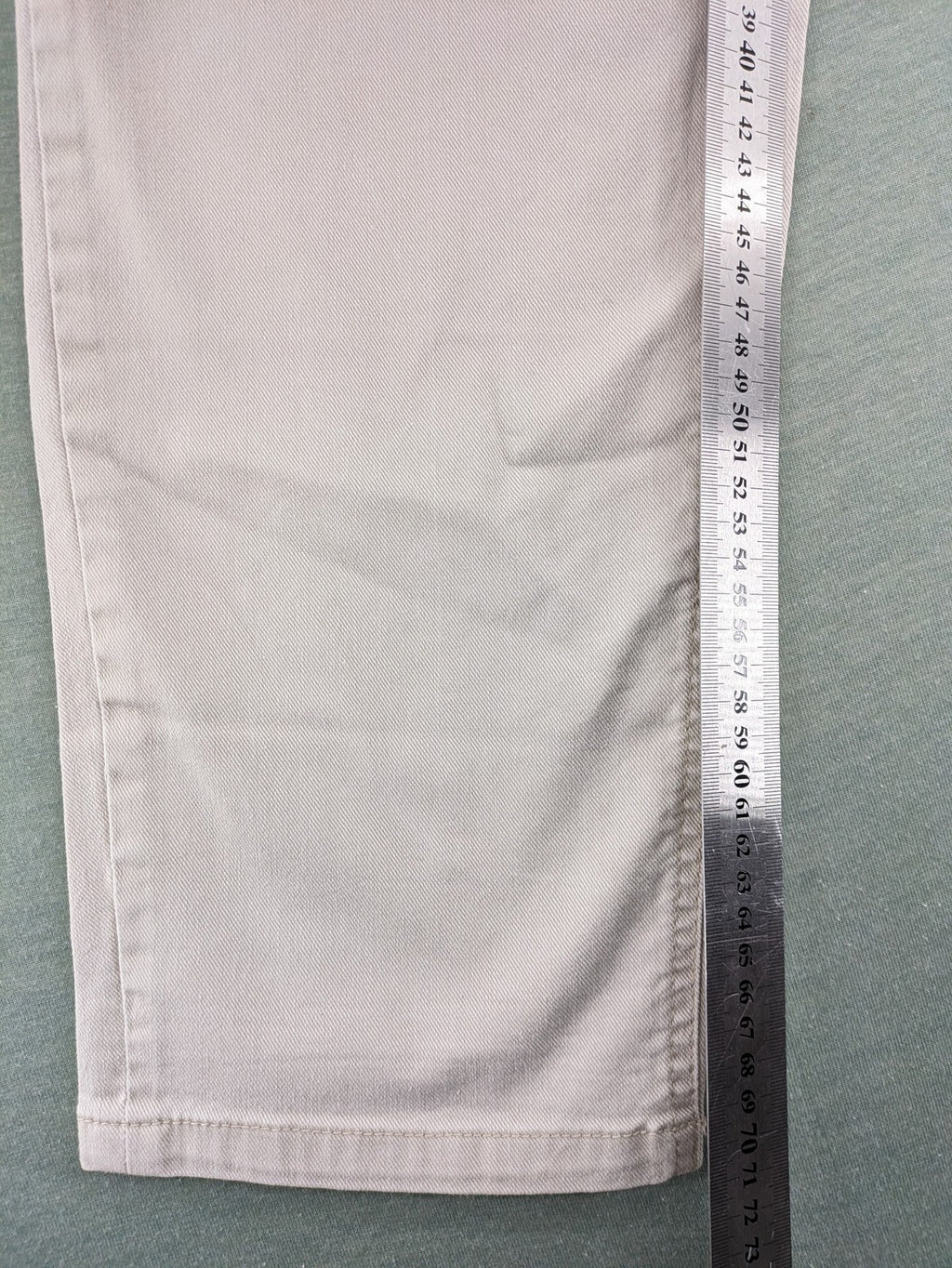 Canda beige straight jeans with strass details and classic five-pocket design.