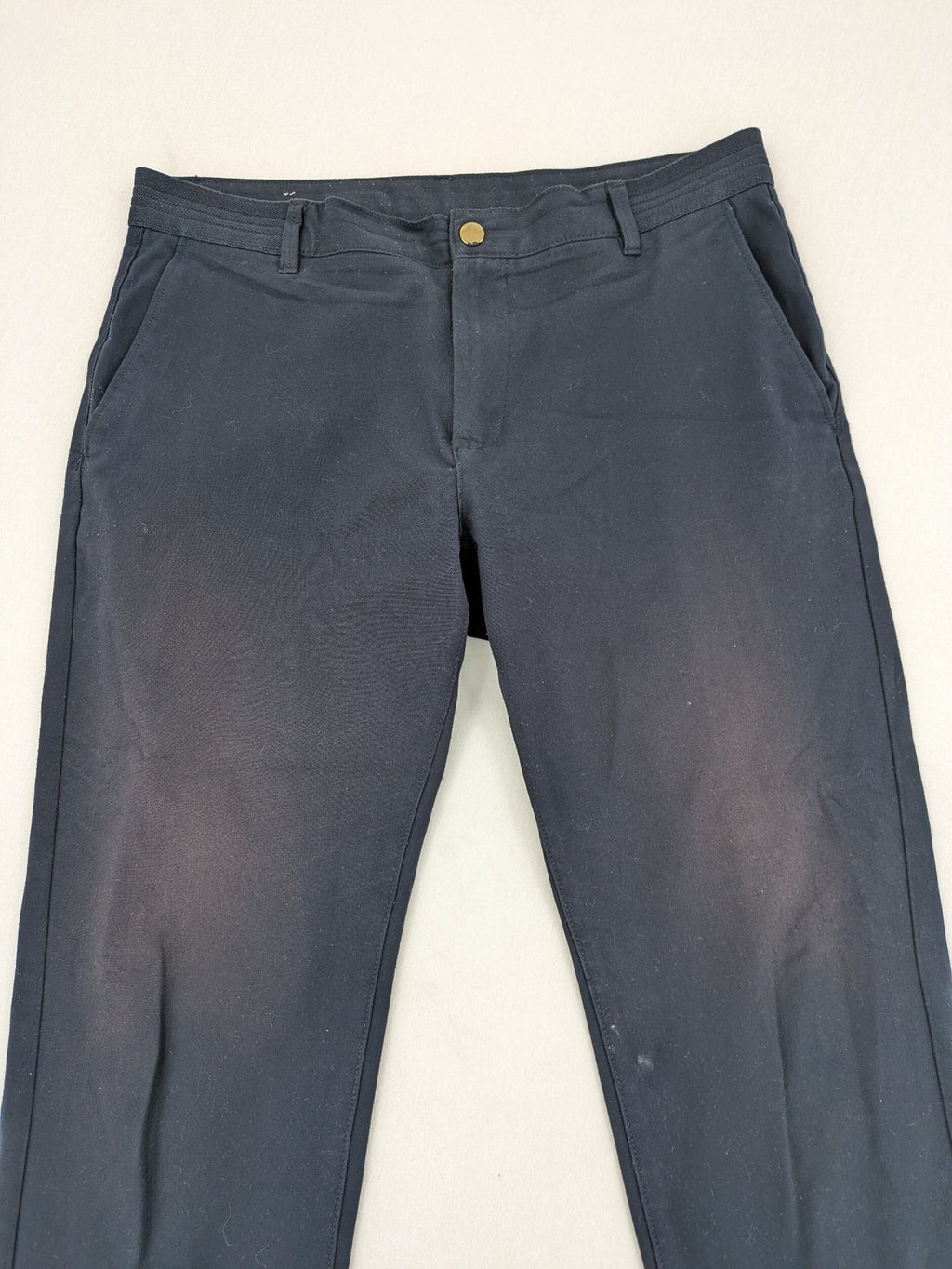 Zara navy chinos flat front design with stretch fabric for comfort and versatility.
