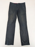 Tommy Hilfiger grey chino pants with TH-Flex stretch technology and classic straight fit design.