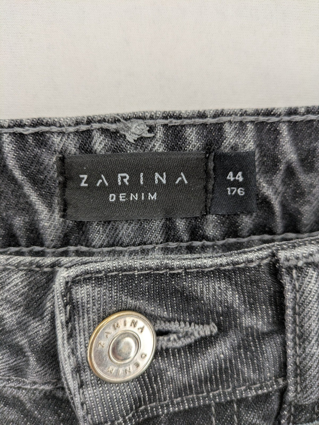 Zarina grey straight jeans high waist with classic 5-pocket design and washed denim texture.