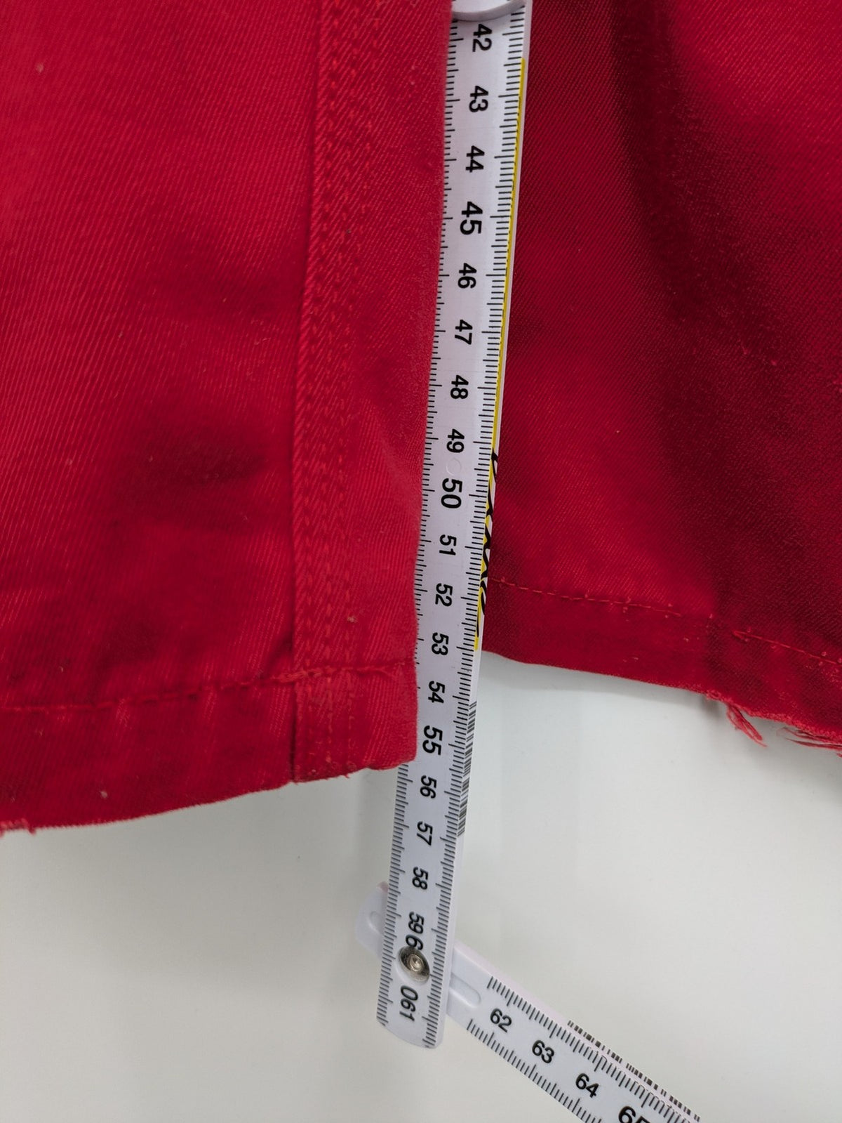Grene navy red overall with adjustable straps, multiple pockets, and durable material.
